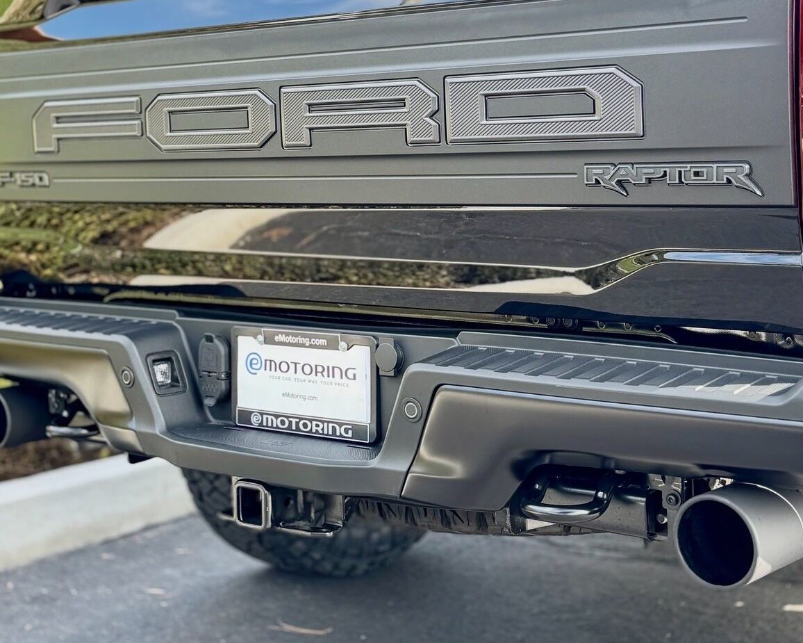 A Ford F-150 Raptor with an eMotoring plate frame