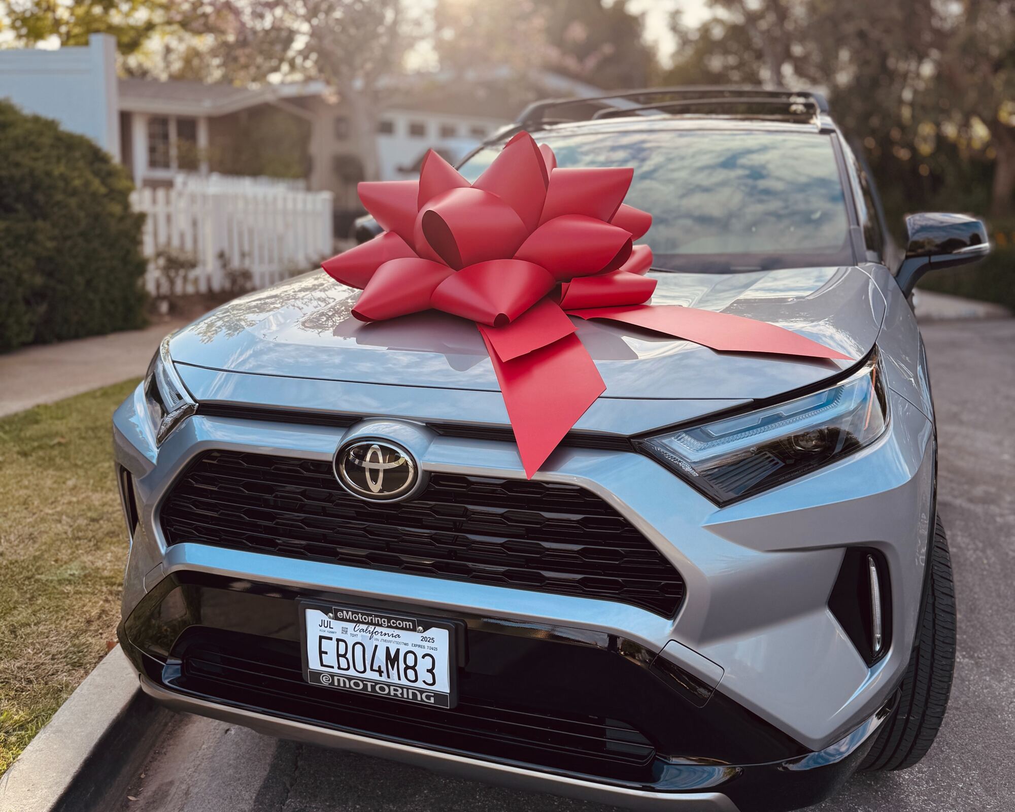 A new Toyota RAV4 with an eMotoring plate frame